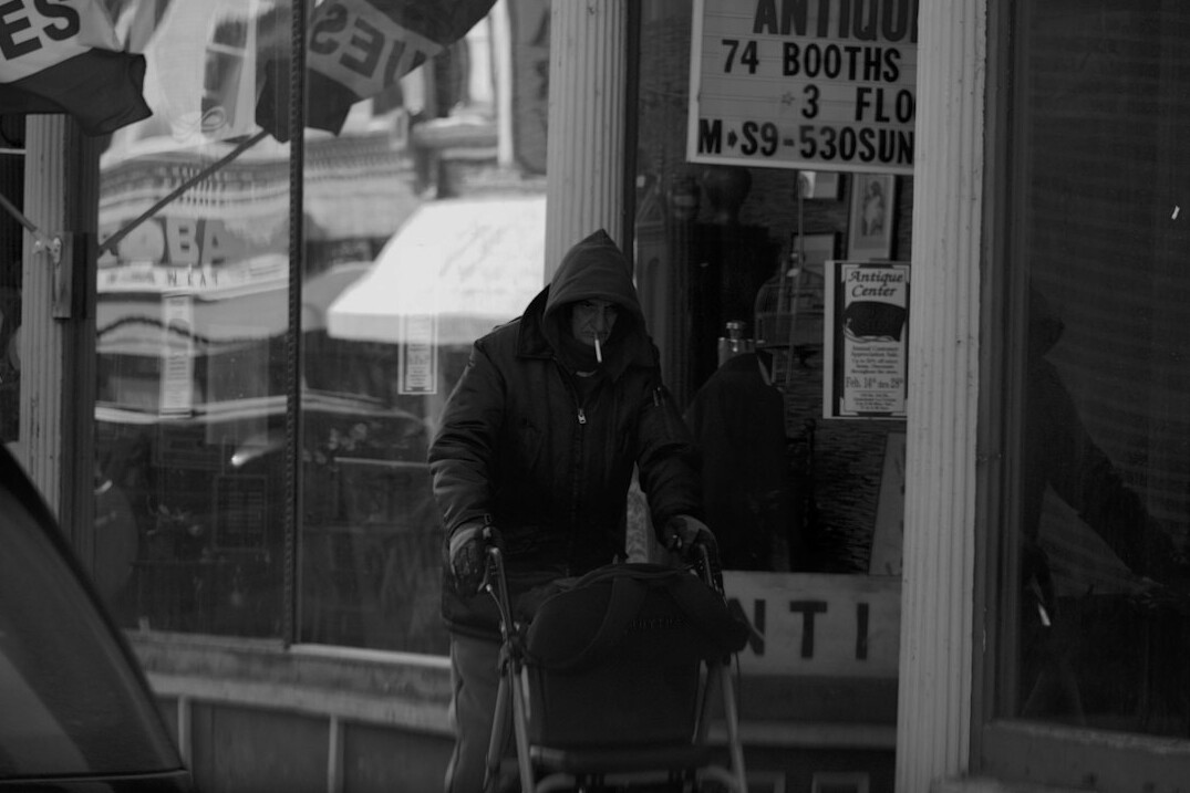 store detective watching shoplifters