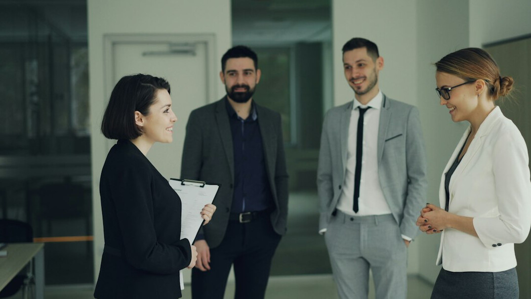 detective talking to staff
